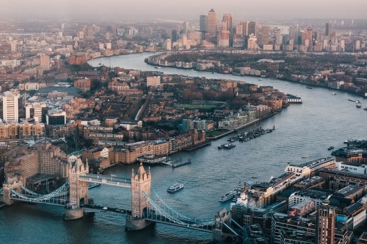 a large body of water with a city in the background