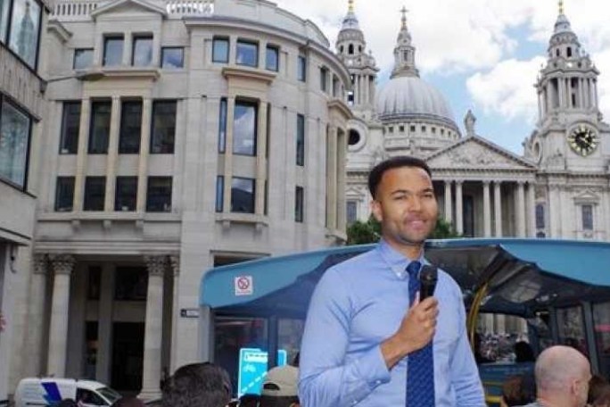 a person standing in front of a building