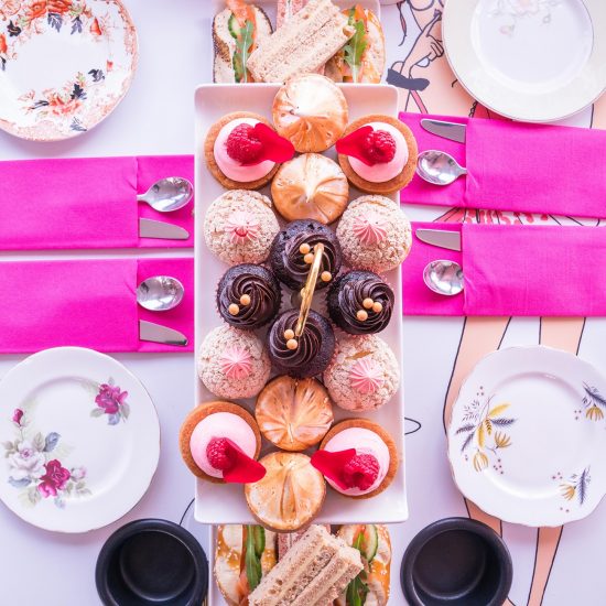 a table topped with plates of food on a plate